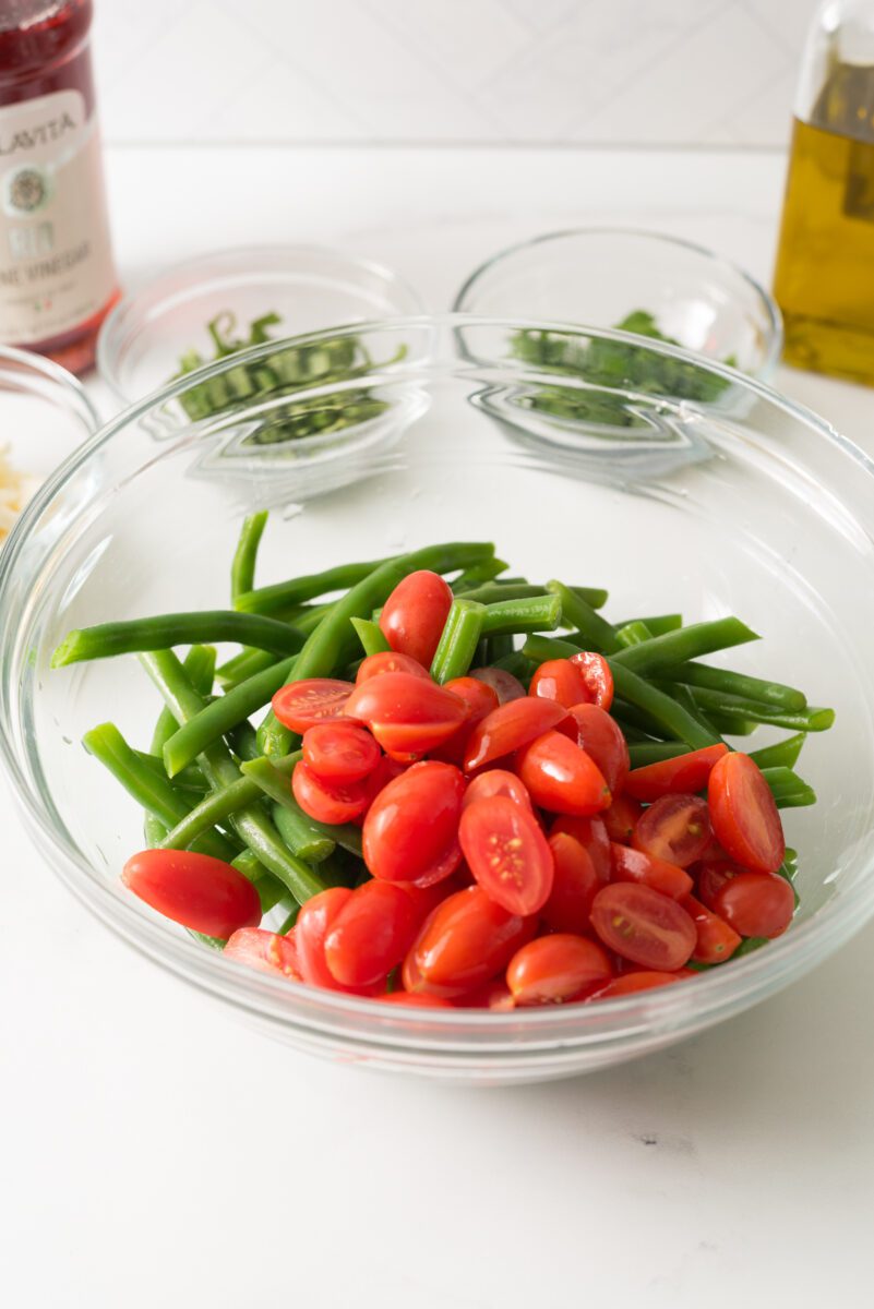 Fresh green beans with tomato and feta cheese combined with herbs and spices