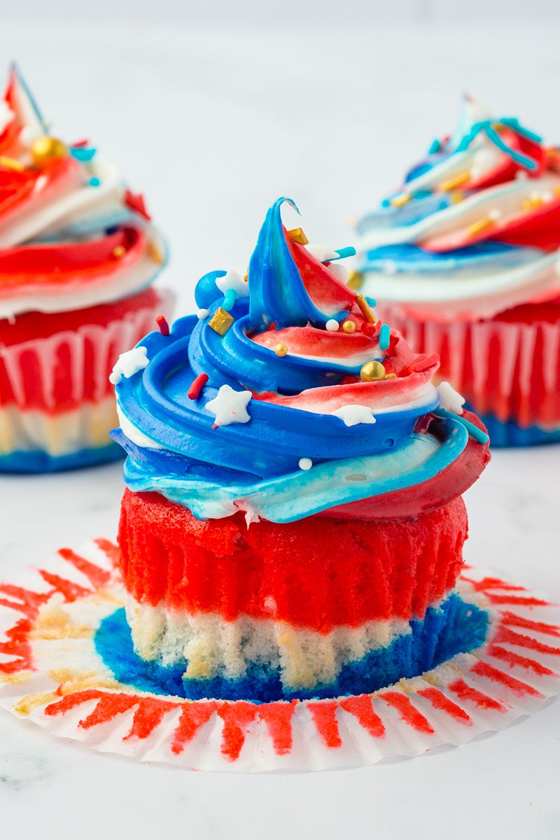 Red White and Blue Cupcake decorated with red white and blue icing with sprinkles. ready for any US Patriotic Holiday