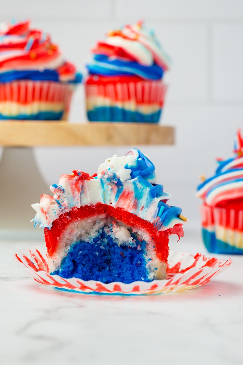 Red White and Blue Cupcake decorated with red white and blue icing with sprinkles. ready for any US Patriotic Holiday
