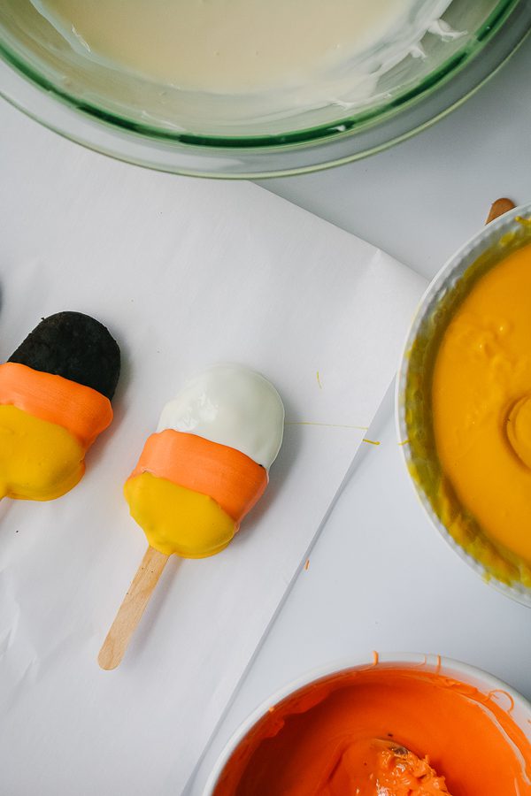 Cake pops that are shaped like candy corn