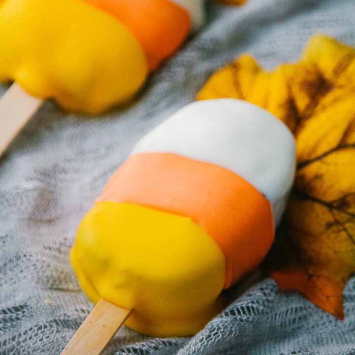 Cake pops that are shaped like candy corn