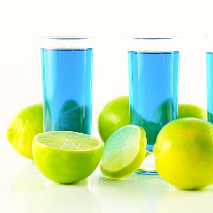 Easy alcohol shots made with vodka, blue Curacao and lime juice
