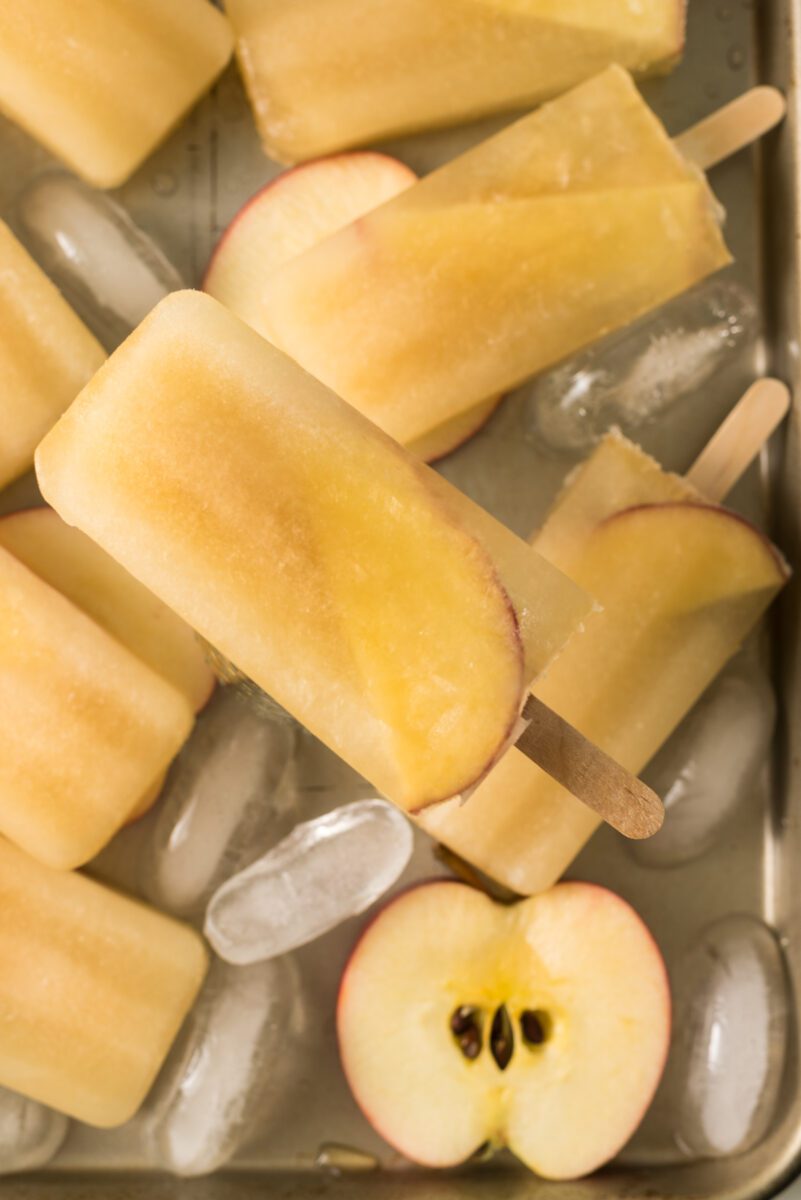 Homemade popsicles made out with apple juice.