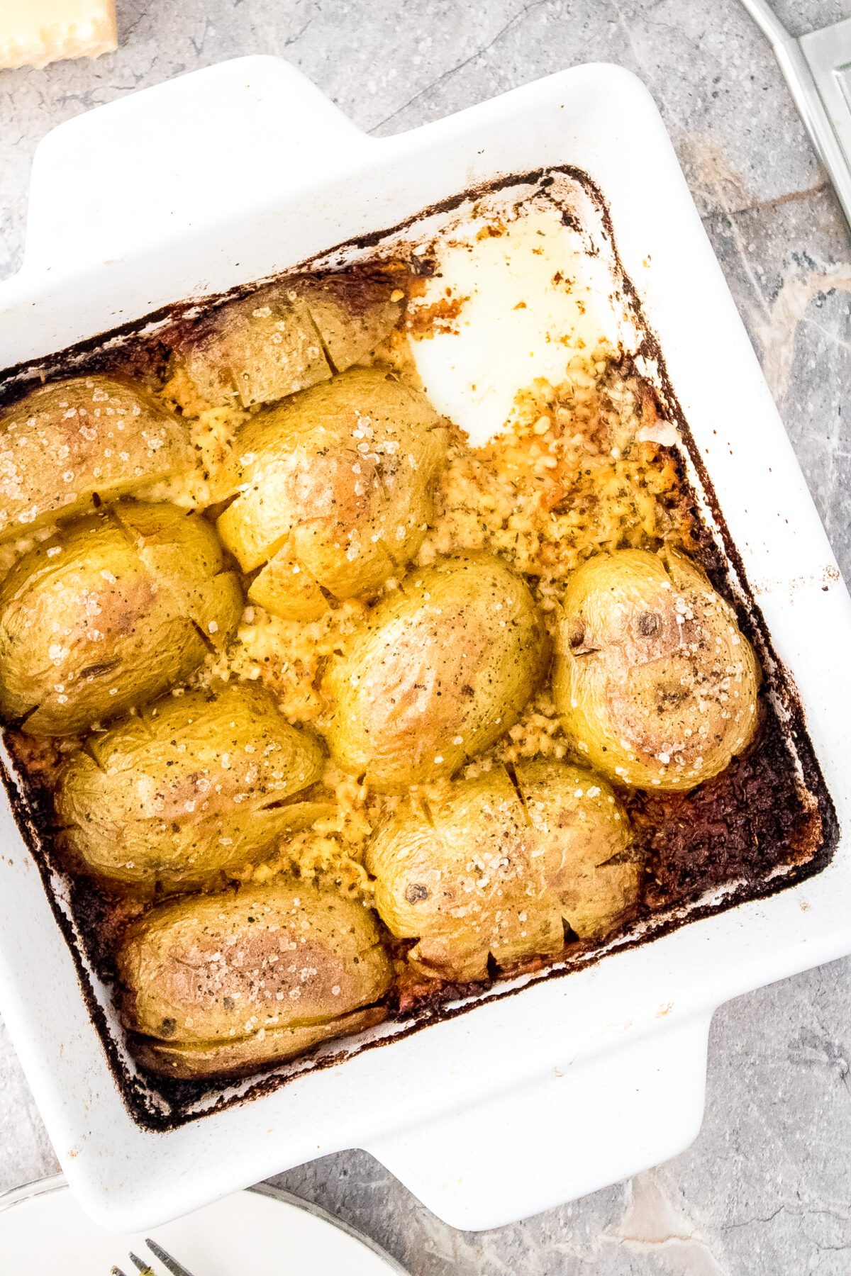 Garlic Parmesan baked Potatoes in a 8x8 baking dish