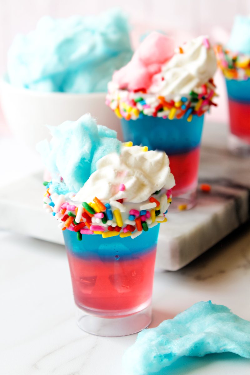two ounce shot glass with cotton candy flavored jello and Vodka inside