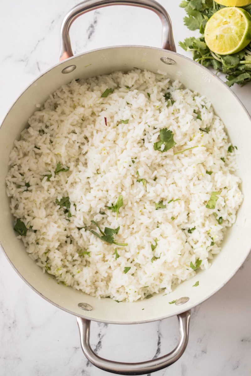Rice made in a large pot with fresh cilantro and fresh lime juice