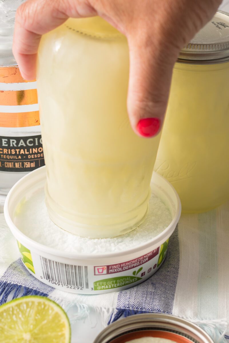 Use a fork to break up and stir the semi-frozen margaritas into a slushy consistency