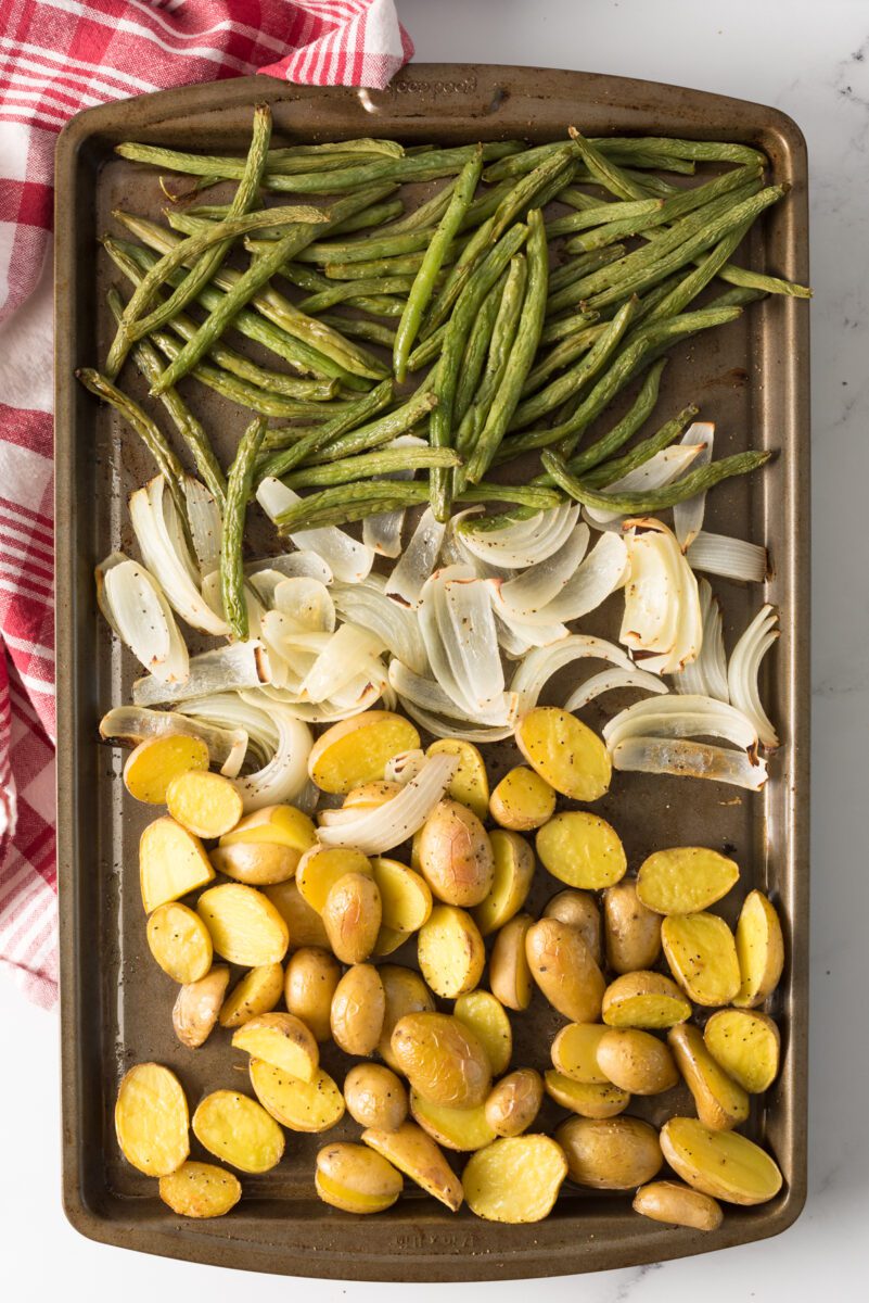 Place the sheet pan into the preheated oven and set a timer