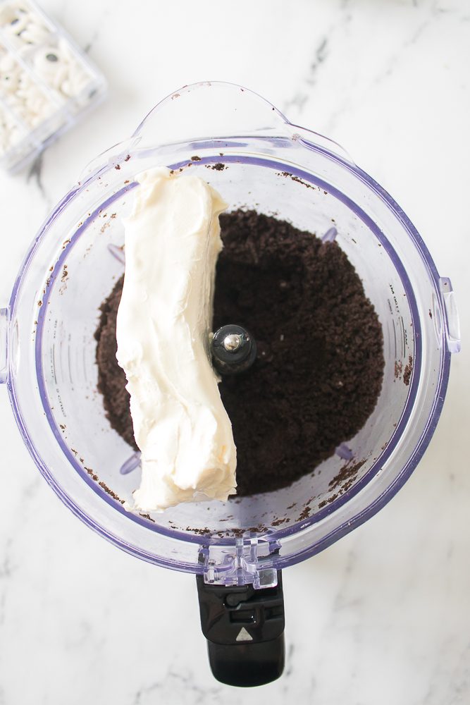 combine the crushed Oreos and the softened cream cheese